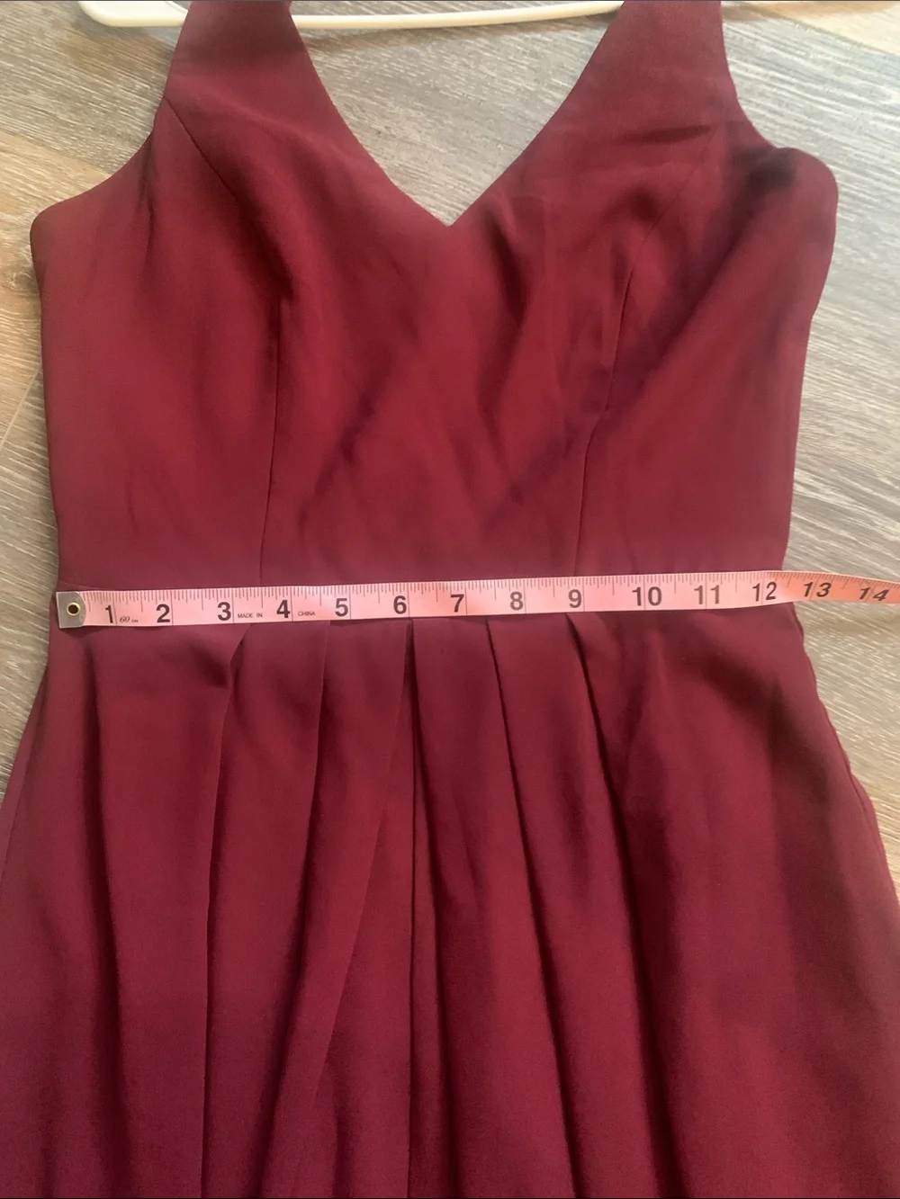 Adelyn Rae Burgundy Sleeveless V-Neck Maxi Dress with an opening between the leg